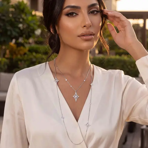 عقد فضة النجمة الرباعية الطويل ذو الدورين image 0