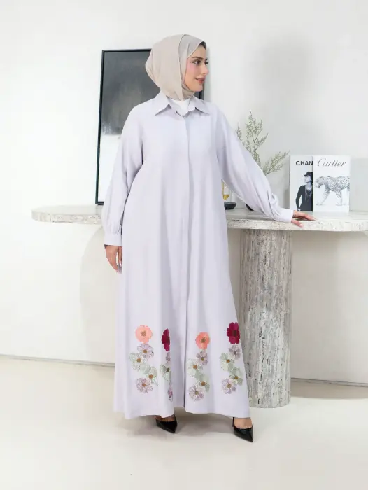 A dress decorated with roses image 1