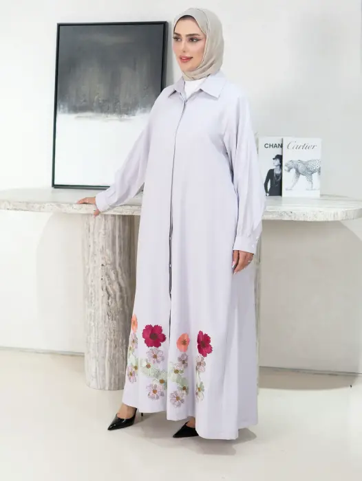 A dress decorated with roses image 0