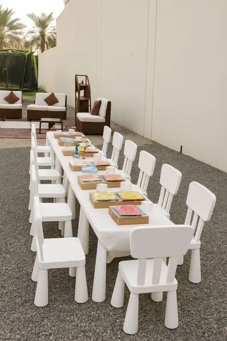 Elegant white chairs and tables rental image 0