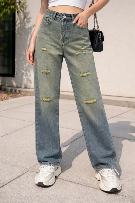 Dirty green jeans image 0